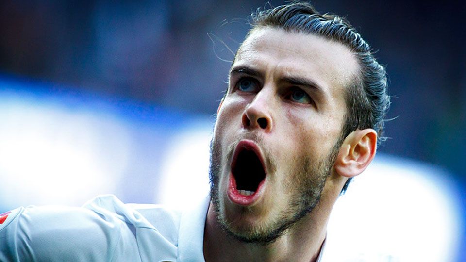 Selebrasi Gareth Bale pada laga saat melawan Espanyol. Copyright: &copy; Guillermo Martinez/Corbis via Getty Images